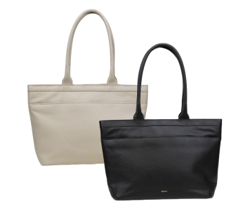 Twee DSTRCT leren shoppers, één in beige en één in zwart, getoond naast elkaar tegen een witte achtergrond.