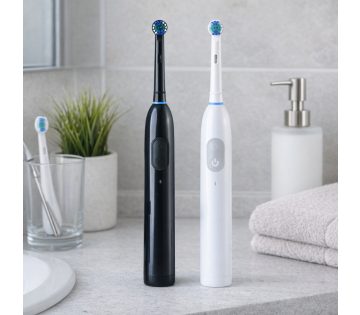 Nexxt Elektrische Tandenborstel in zwart en wit in sfeersetting